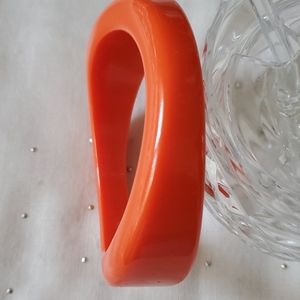 Orange wave shaped plastic Bracelet